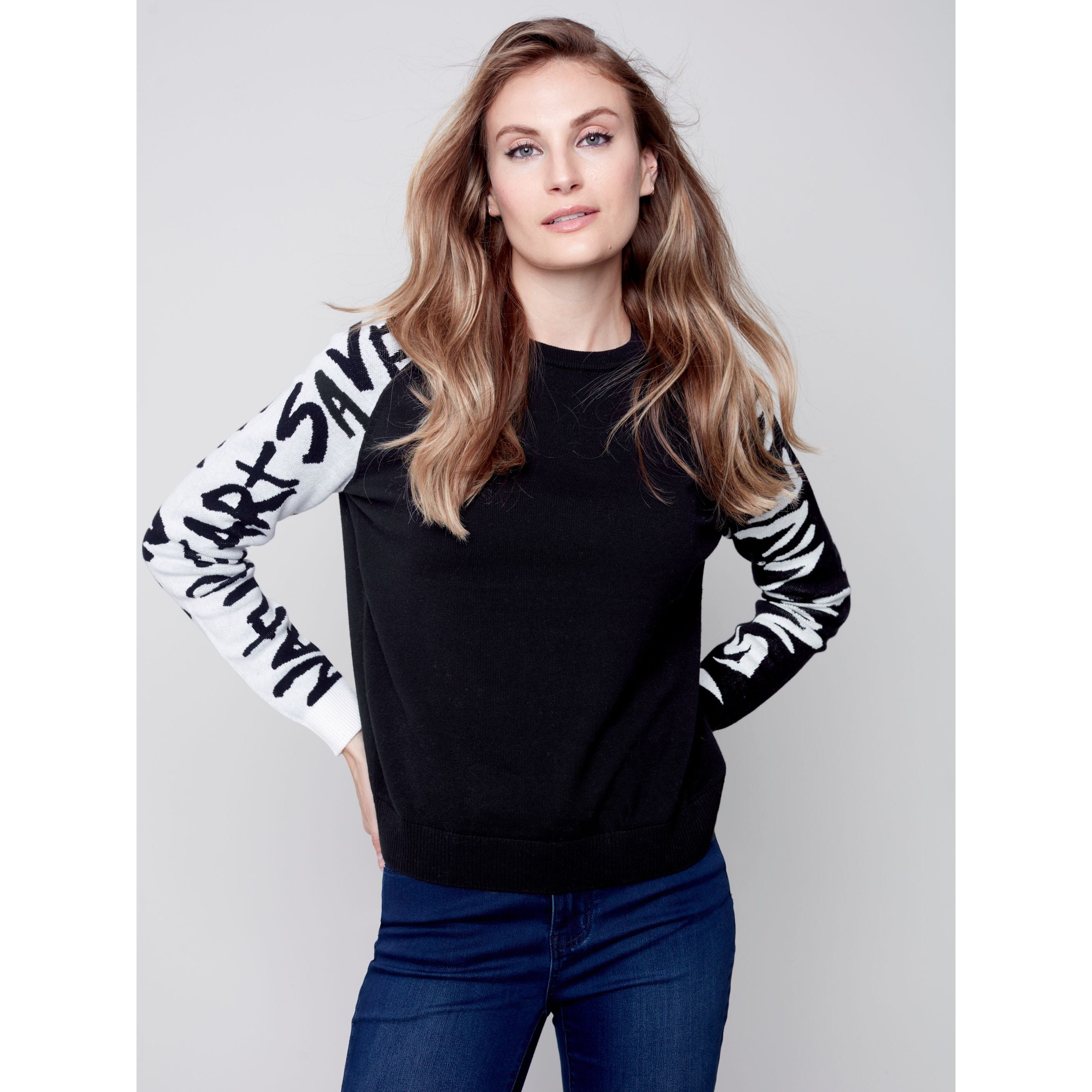 Sweater with writing on sale sleeves